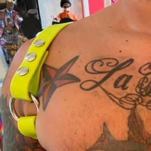 Neon Yellow rubber harness for fetish or party wear.